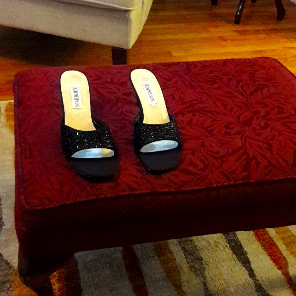 Black slide on dressy sandals.